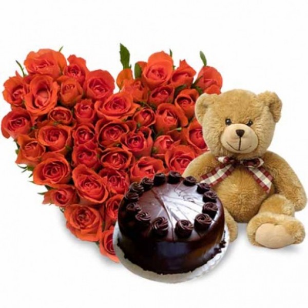 Heart Shape Arrangement of 60 Red Roses with Teddy (10 inches) and Dark Chocolate Cake ( Half Kg)